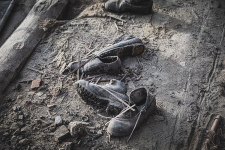 Old dusty shoes in an abandoned house.