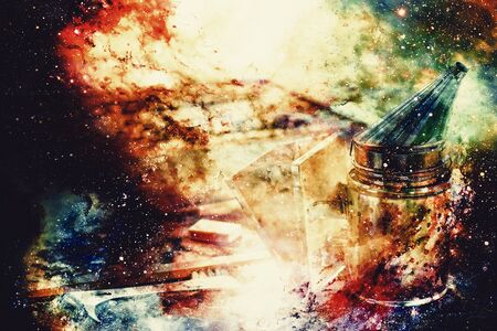 Smoke beekeeper for processing bees by smoke on abstract structured space backgroundの写真素材