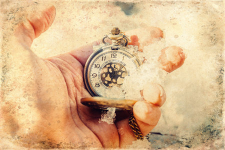 Historic watch in hand, old photo effect