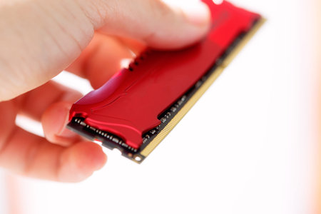 computer memory in technic hand. White background.