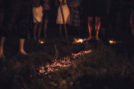 Walk on fire in night.の写真素材