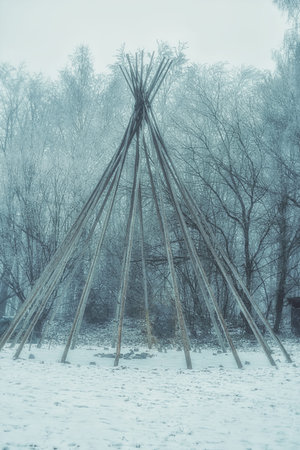 disassemble teepee in winter, wooden construction teepee.の写真素材