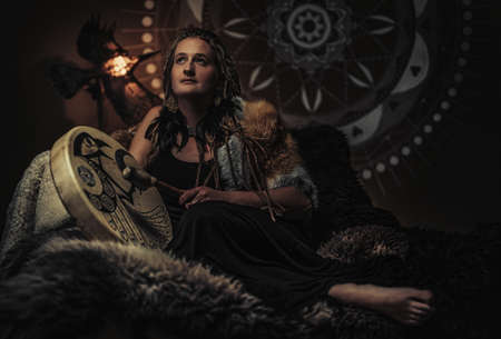 beautiful shamanic woman in the interiors.の写真素材