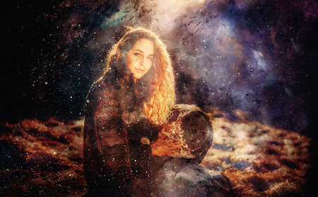 shamanic girl with drum on abstract structured space background.の写真素材