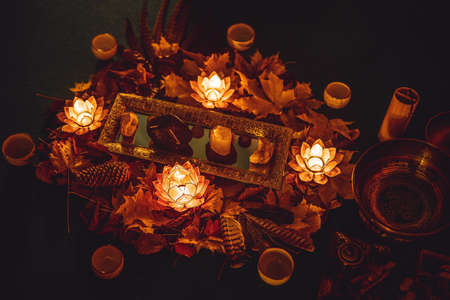 beautiful tibetan bowl and candles, ceremonial space.の写真素材