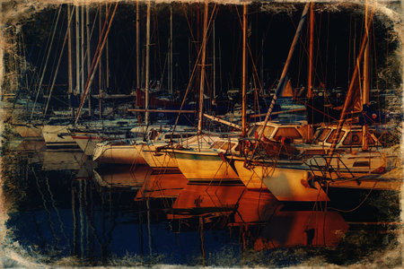 Sea bay with yachts at summer sunset. Old photo effect.