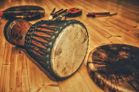 musical instruments on a wooden floor.の写真素材