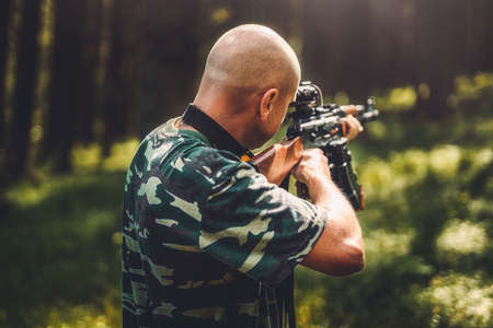 Airsoft hand in the nature.の写真素材