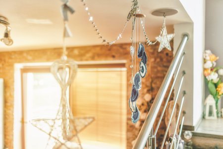 Chime with colored stones in the apartment.
