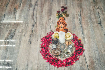 Beautiful altar with rose petals and goddess breasts. ceremony space.の写真素材