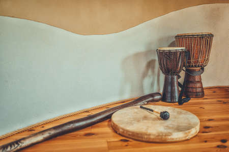 Shaman drums and djembe with didgeridoo. Ceremony space.の写真素材