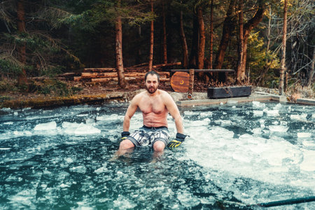 Winter swimming. Man in an ice-hole. winter hardening.の写真素材