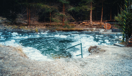 Beautiful frozen natural pool, winter hardening.の写真素材