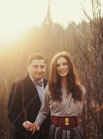 Young attractive couple in love. Sunny days, soft light.の写真素材