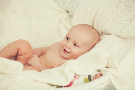 portrait of a cute baby in a cribの写真素材