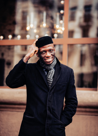 portrait of a smiling African American men in the cityの写真素材