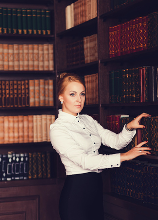 professional and beautiful confident woman in shirtの写真素材