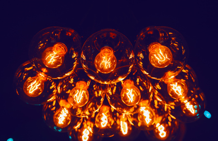 Glowing Leds filament lamps in darknessの写真素材