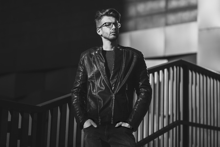 Elegant handsome man in leather jacketの写真素材