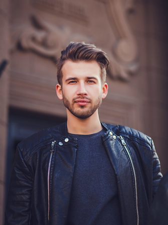 Close up portrait of a handsome man in a stylish jacketの写真素材