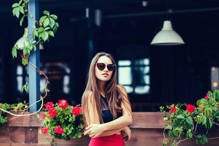 Beautiful sexy tourist girl walking in city street with long hairの写真素材