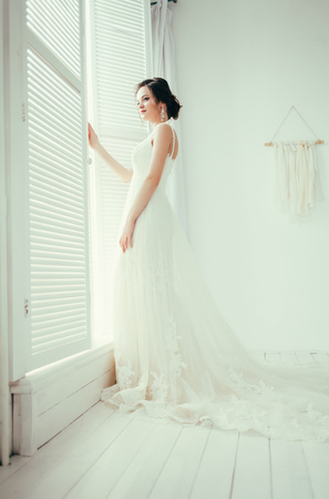 Young beautiful bride in wedding dressの写真素材