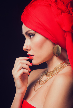 beauty close-up portrait of woman in redの写真素材