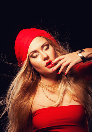 fashion portrait of the blonde in the studioの写真素材