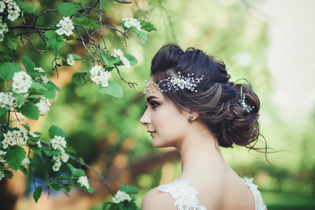 Beautiful woman with wedding flowers Bride with wedding makeup and hairstyle.の写真素材