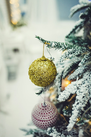 Decorated Christmas tree with balls on blurred backgroundの写真素材