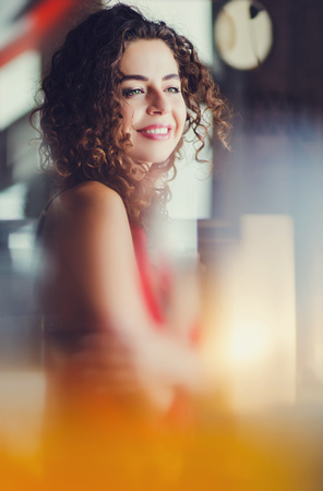 Beauty portrait of curly female face with natural skinの写真素材