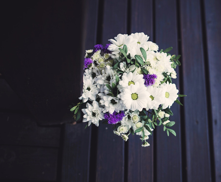 Creative bouquet with flowers. Spring minimal concept.の写真素材