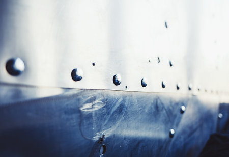 silver metal surface with rivetsの写真素材