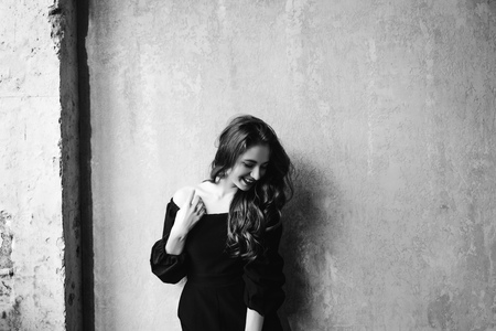 Portrait of a pretty happy woman on background. copy spaceの写真素材