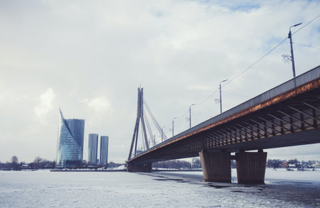 Bridge across the winter Daugava river in Riga, Latviaの写真素材