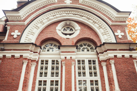 antique brick Church with white old Windows