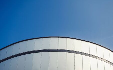 modern building against blue sky in Europeの写真素材