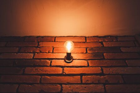 old vintage lamp on a brick wallの写真素材