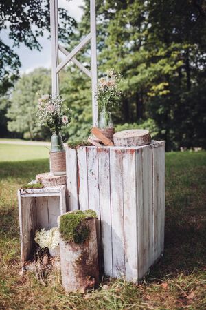 Vintage wedding decorations. Wooden and floral decorationsの写真素材