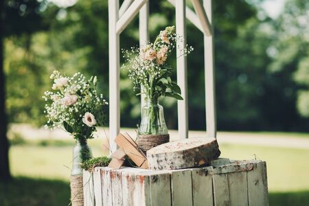 elements of wedding design. bottle with water and flowersの写真素材