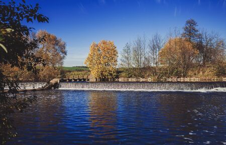 autumn Park with waterfall and lakes. eco landscapeの写真素材