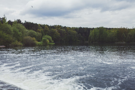 river flow in the summer park. horizontal images
