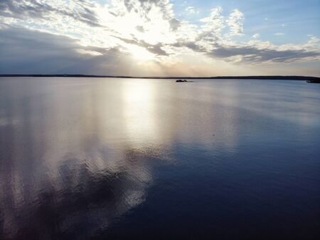 Beautiful sea landscape. sunset sky over the lakeの写真素材
