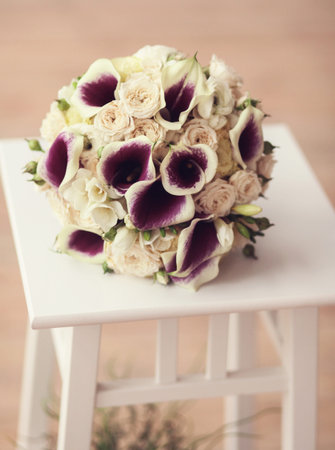 close-up of a wedding bouquet on a chairの写真素材