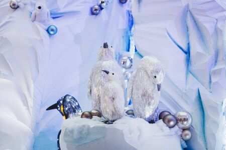 Christmas decorations - penguin with Christmas ballsの写真素材