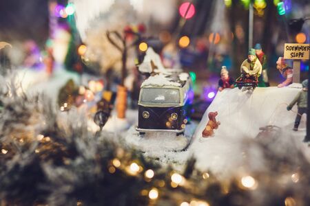 miniature image of Christmas scene-retro bus and people with sledsの写真素材