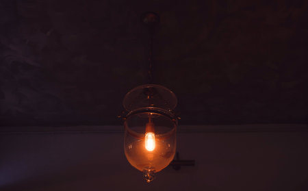 vintage old lamp in dark cafe room