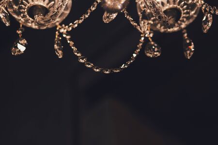 crystal glamorous chandelier in a luxurious interiorの写真素材