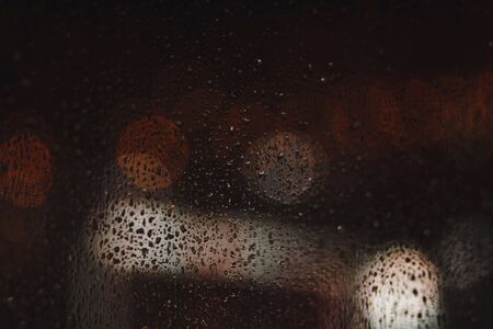 concept background with water drops on window with blurredの写真素材