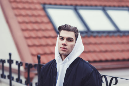 Portrait handsome man fashion model in urban background